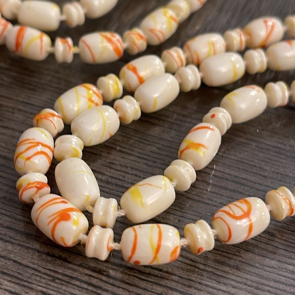 Vintage Beaded Necklace Ivory with Orange and Yellow Paint Splatter Design - Picture 2 of 13
